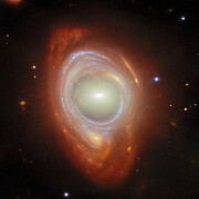 Spying a spiral through a cosmic lens