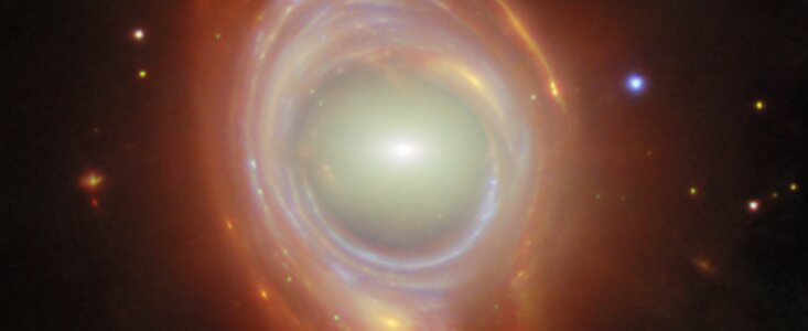 Spying a spiral through a cosmic lens