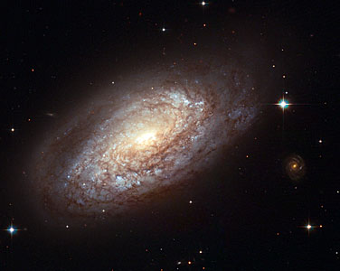 Galaxy NGC 2397 with an explosive secret