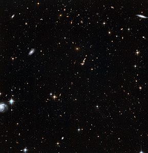 Stars in the Andromeda Galaxy’s halo with background galaxies (2)