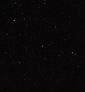 The area around merging galaxy duo Arp 142 (ground-based image)