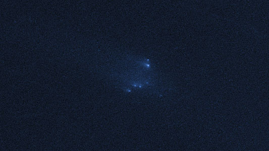 Disintegrating asteroid P/2013 R3 as viewed by Hubble on 14 January 2014