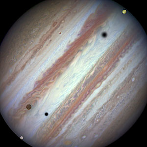 Three moons and their shadows parade across Jupiter — end of event