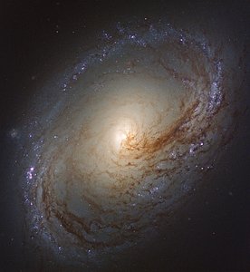 Wave of star formation in Messier 96