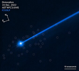 Hubble sees boulders escaping from asteroid Dimorphos (annotated)