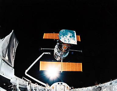 Sunburst between Hubble and Discovery