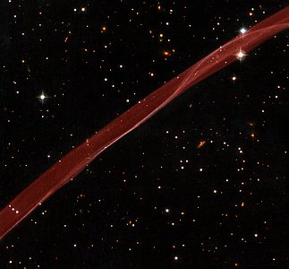 Hubble sees stars and a stripe in celestial fireworks