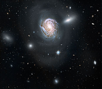 Spiral galaxy NGC 4911 in the Coma cluster