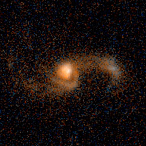 Merging galaxies — 5.3 billion light-years from Earth