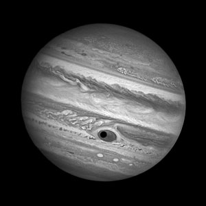 Jupiter's Great Red Spot and Ganymede's shadow — black and white