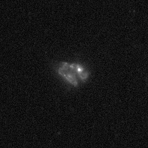 Outflows from merging galaxy J1558+3957