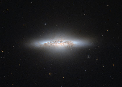 A galaxy colourfully waning