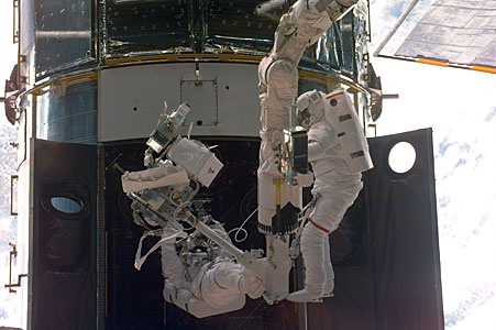 SM3A: Astronauts use the RMS to perform Servicing Tasks