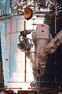 SM2: Astronaut opening Aft Shroud