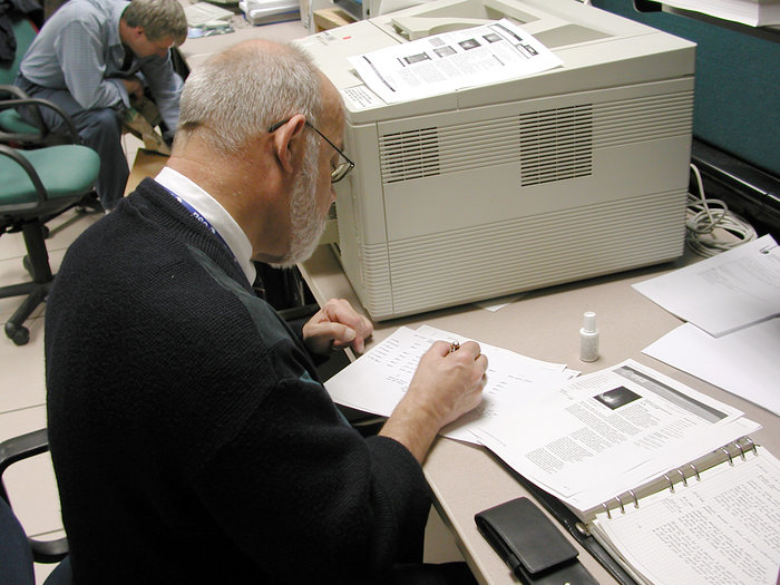 Antonius (Ton) Linssen at work in his corner in the 'Attached Shuttle Payload Control Center'