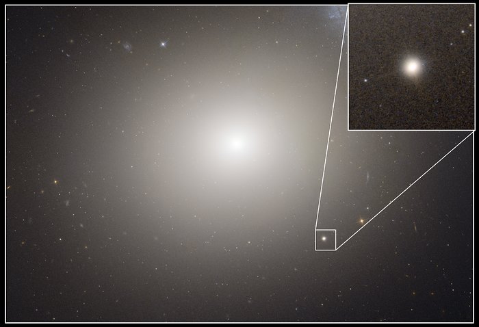 Hubble image of Messier 60 and M60-UCD1