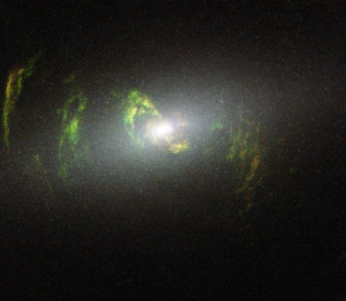 Hubble view of green filament in galaxy NGC 5252