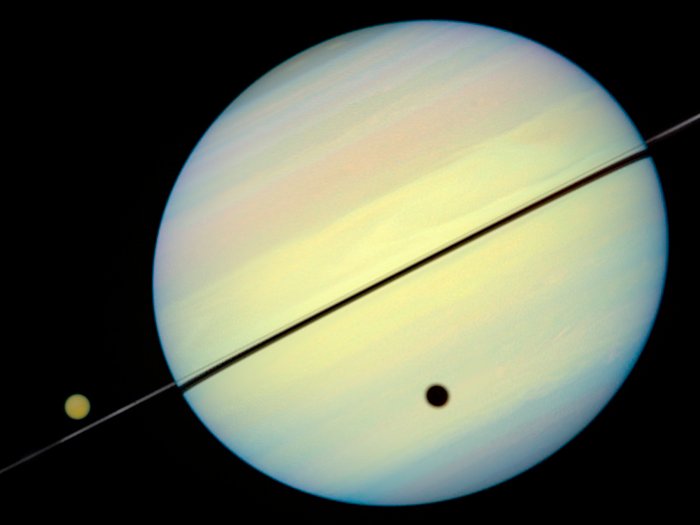 Hubble Catches Titan Chasing Its Shadow - Frame 3