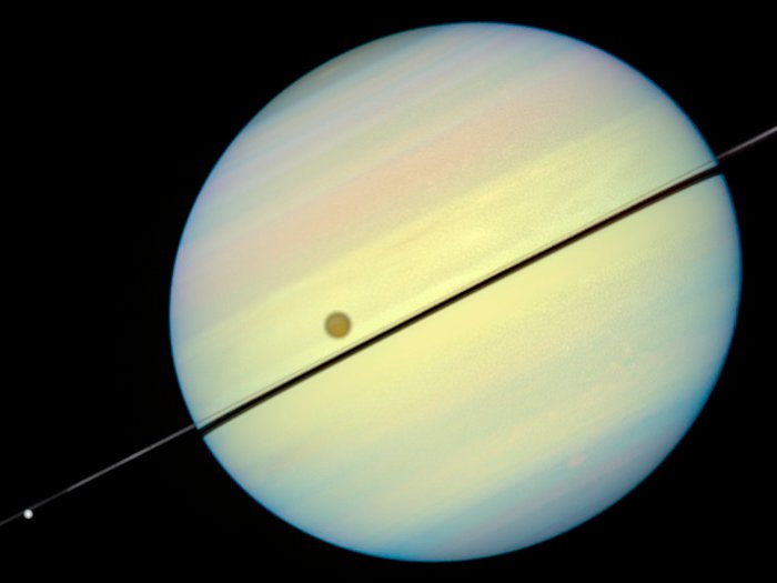 Hubble Catches Titan Chasing Its Shadow - Frame 5