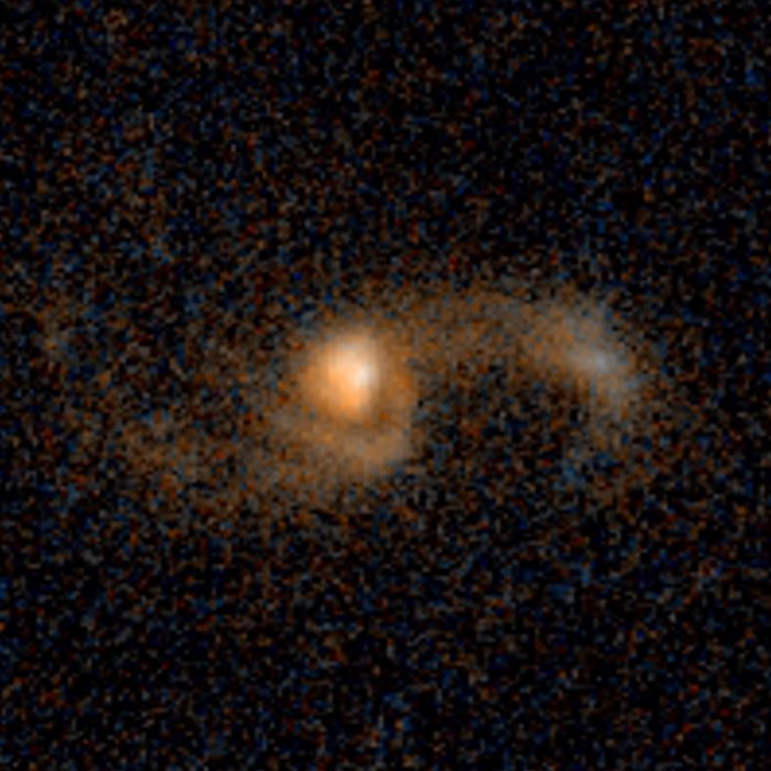 Merging galaxies — 5.3 billion light-years from Earth