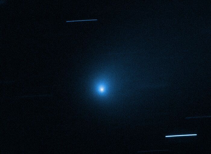 Carbon Monoxide Abundance Points to Comet's Birth Around Cooler Star