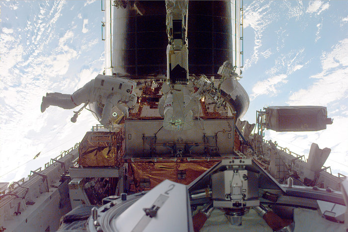 SM3A: Astronauts Performing Servicing Tasks